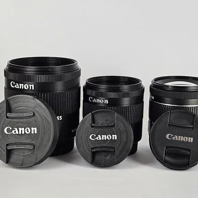 Hộp đựng ống kính Canon EF-S 18-55mm và giá đỡ bút