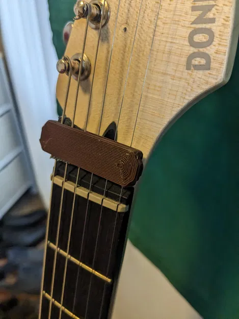 Bộ giảm âm dây đàn guitar dễ in 3D - Image 1