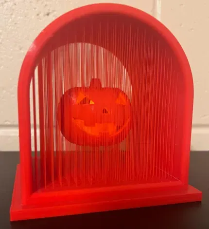 Đèn lồng bí ngô treo trong khung hình bia mộ - Image 3