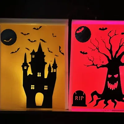 Trang trí Halloween với nến tea light và hình ảnh ma quái