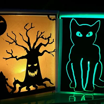 Trang trí Halloween với nến tea light và hình ảnh ma quái