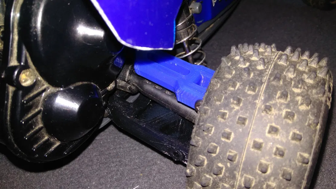 Giá đỡ bánh sau trên cao cho khung Tamiya DT-02/03/04 - Image 1