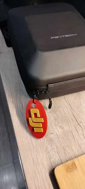 Móc khóa logo DJI cho ba lô và phụ kiện drone - Image 4