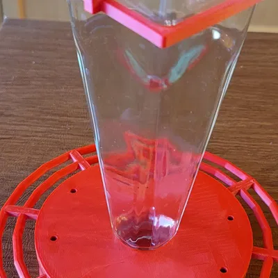 Máy cho chim ruồi với chai nước sốt Girard