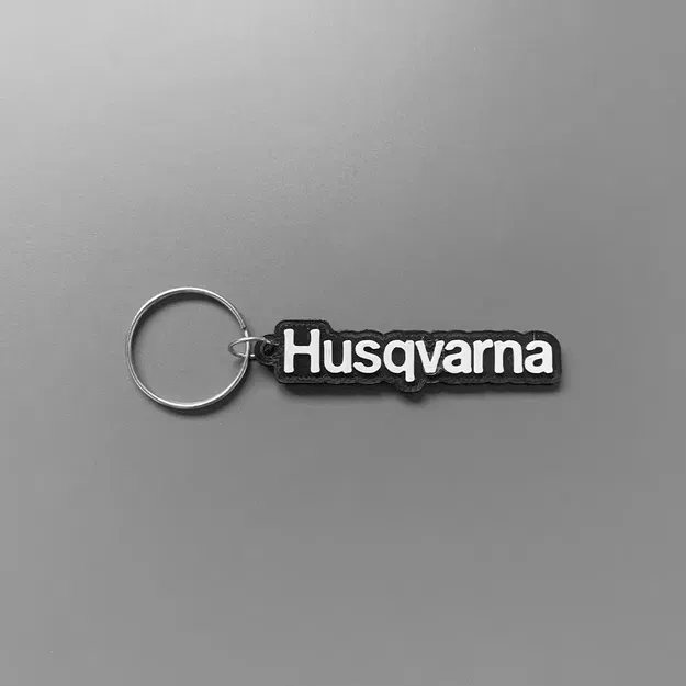 Móc khóa thương hiệu Husqvarna in 3D với thiết kế đơn giản - Image 1