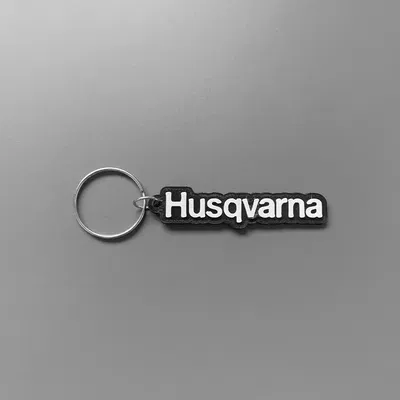 Móc khóa thương hiệu Husqvarna in 3D với thiết kế đơn giản