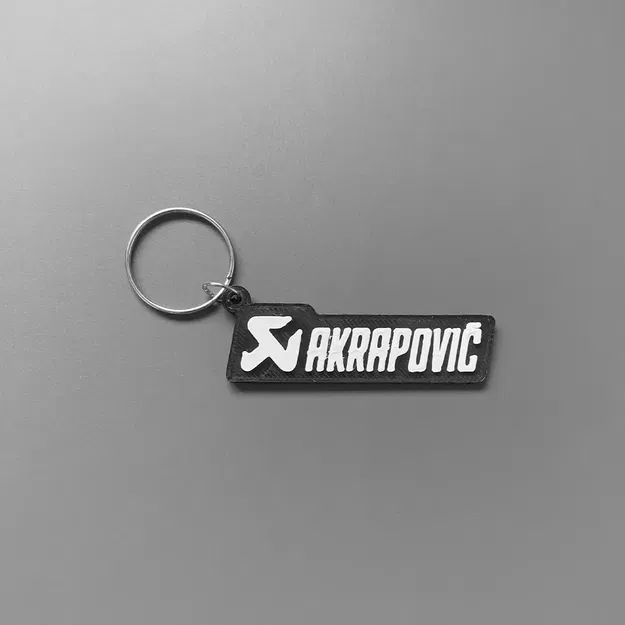 Móc khóa thương hiệu Akrapovic thiết kế đơn giản 3D - Image 1