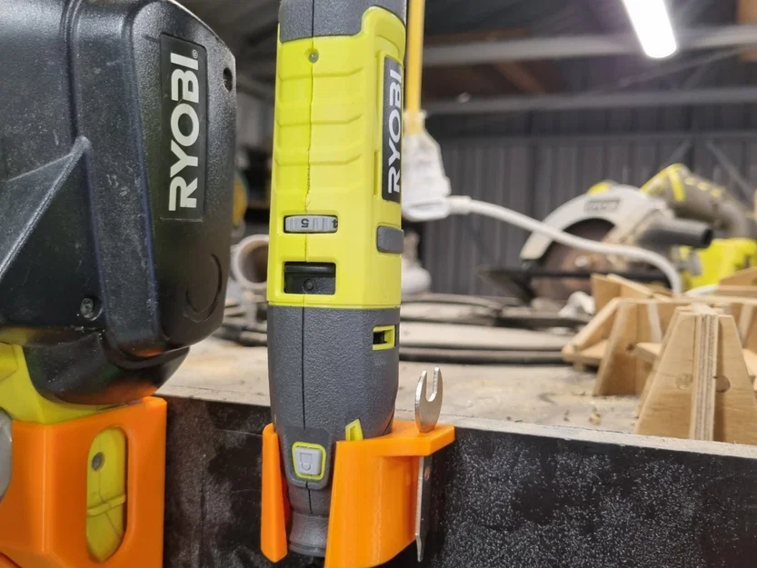 Giá đỡ công cụ quay Ryobi 4V với chỗ để chìa khóa kẹp - Image 1