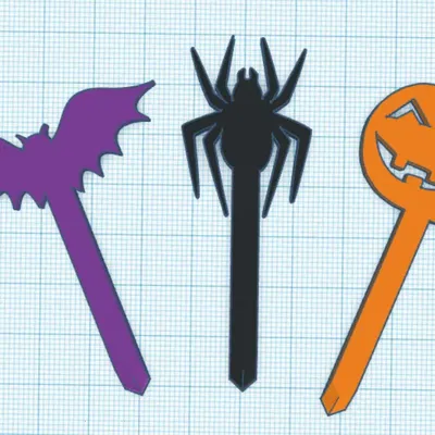 Nắp bánh cupcake Halloween với hình bí ngô, nhện và dơi