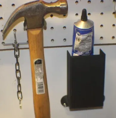 Giá đỡ ống keo treo tường tiện lợi - Image 1