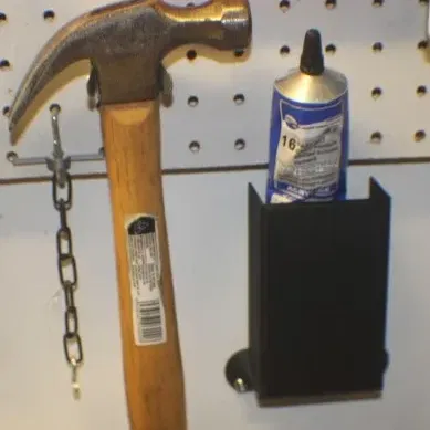 Giá đỡ ống keo treo tường tiện lợi