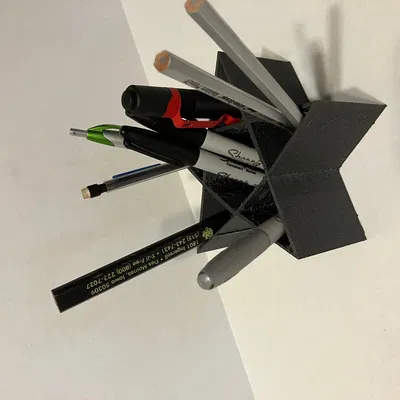 Giá đỡ bút hình sao độc đáo cho bàn làm việc