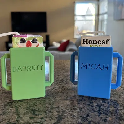 Giá đỡ hộp nước trái cây cho trẻ em có tay cầm