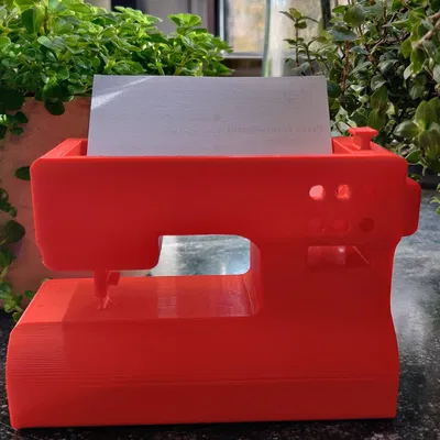 Giá đỡ danh thiếp hình máy may độc đáo