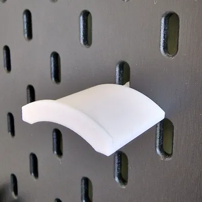 Giá đỡ băng dính đơn giản cho bảng Skadis của Ikea