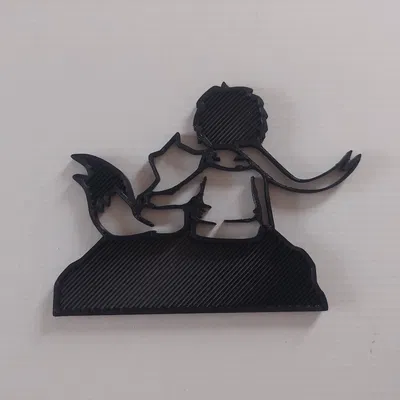 Silhouette hoàng tử bé ngồi trên mặt trăng với cáo