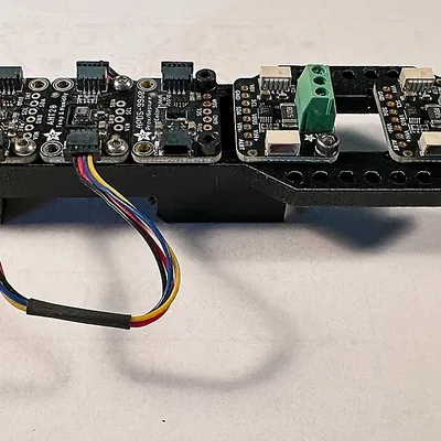 Giá đỡ Din Rail cho các mô-đun Qwiic của Adafruit