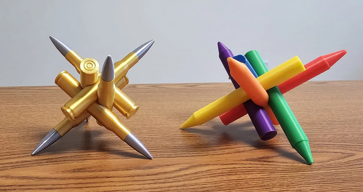 Câu đố hình trụ, viên đạn và bút sáp trên bàn làm việc - Image 1