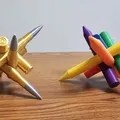 Câu đố hình trụ, viên đạn và bút sáp trên bàn làm việc - Thumbnail 1