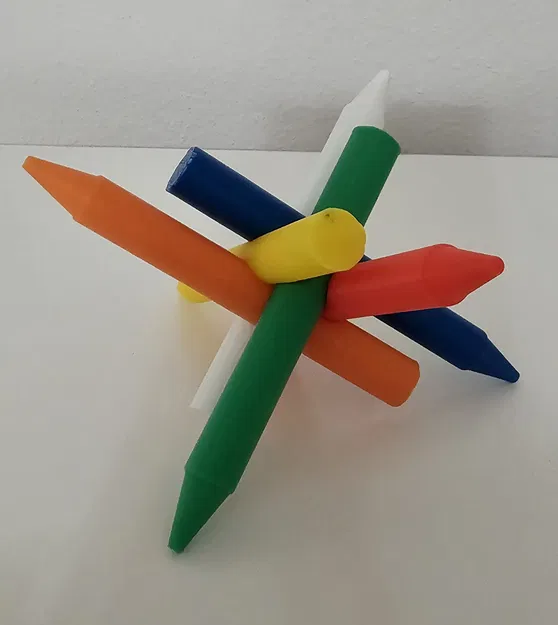 Câu đố hình trụ, viên đạn và bút sáp trên bàn làm việc - Image 3