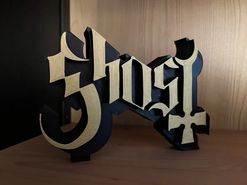 Biểu tượng Ghost B.C. in đen mờ với chữ vàng nổi bật - Image 1