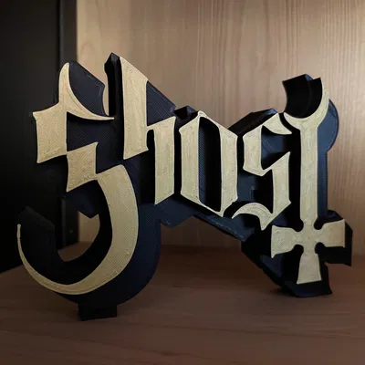 Biểu tượng Ghost B.C. in đen mờ với chữ vàng nổi bật