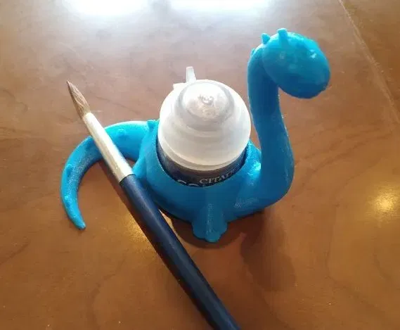 Giá đỡ bình sơn hình khủng long dễ thương - Image 1