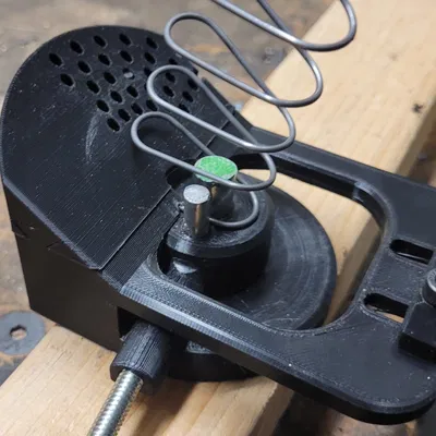 Máy chế tạo lò xo cho băng đạn AR-15