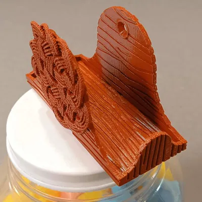 Giá đỡ hộp diêm với trang trí nút thắt đẹp mắt