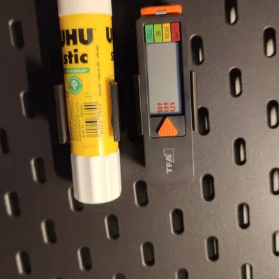 Giá đỡ kiểm tra pin và keo dán IKEA Skadis