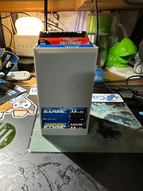 Hộp đựng pin AA với dây cao su và khe cắm hình "X - Image 1