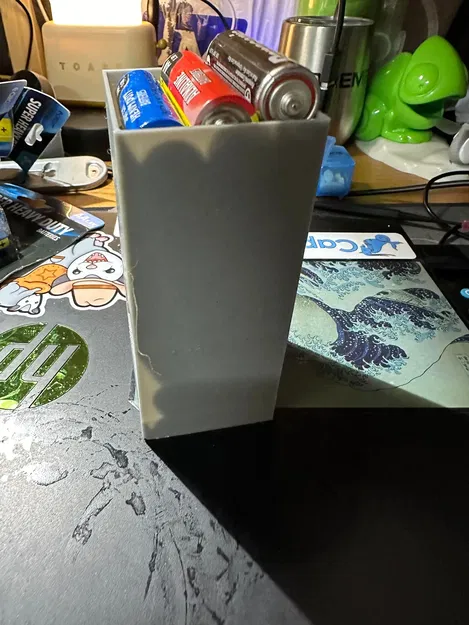 Hộp đựng pin AA với dây cao su và khe cắm hình "X - Image 2