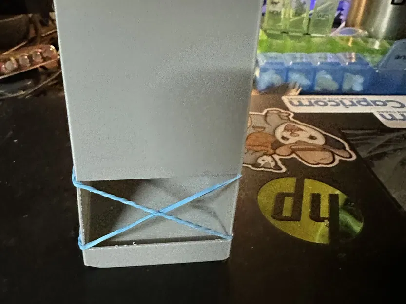 Hộp đựng pin AA với dây cao su và khe cắm hình "X - Image 3