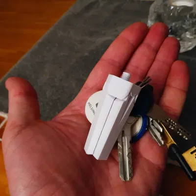 Giá đỡ chân máy ảnh mini dạng móc chìa khóa với vít 1/4