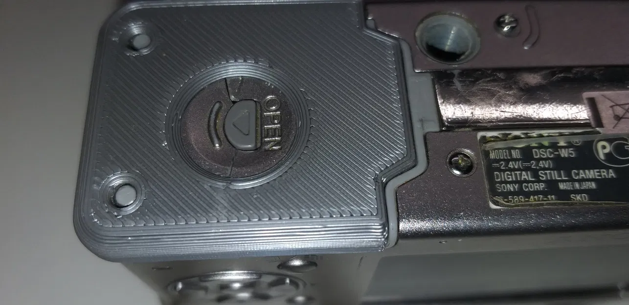Sửa chữa nắp pin cho máy ảnh Sony Cybershot DSC-W5 - Image 2
