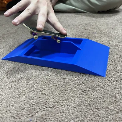 Fingerboard Ramp with rail, gap, and planter