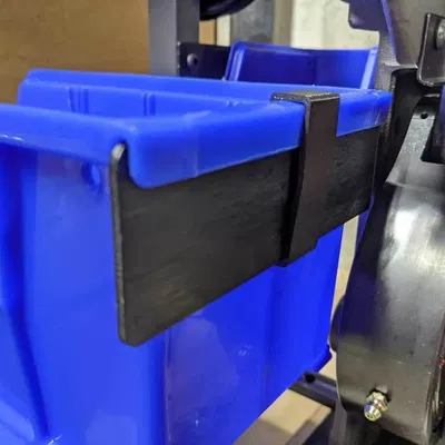 Kẹp Hộp Hứng Đạn Cho Dillon 1100, 1050