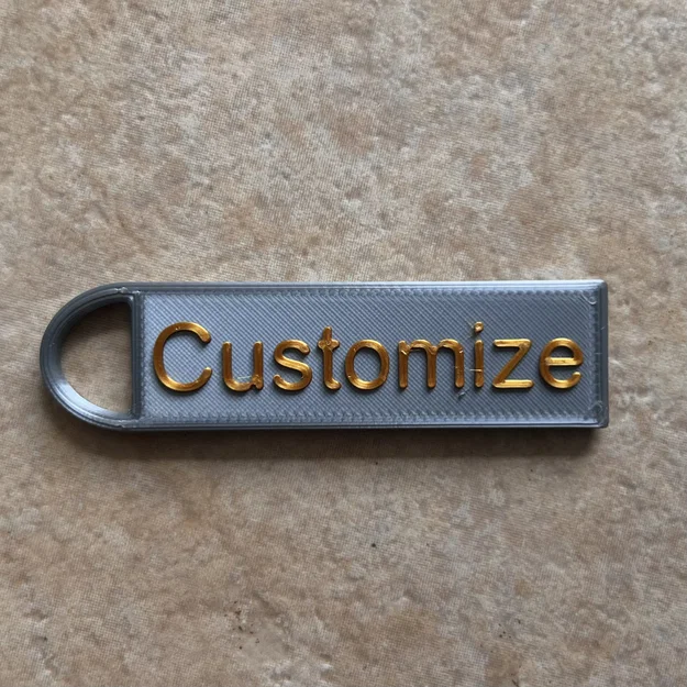 Móc Khóa Chữ Ký Dập Nổi - Image 1