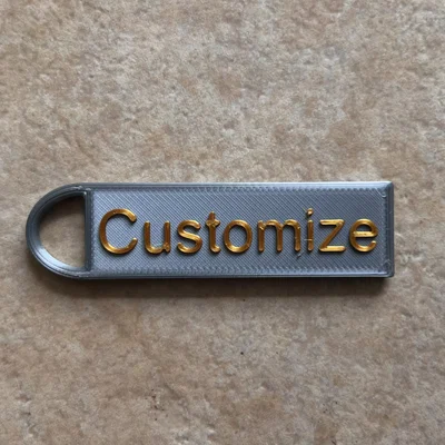 Móc Khóa Chữ Ký Dập Nổi