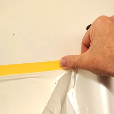 Con lăn băng keo che sơn