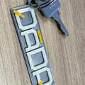 QÁDR Keychain logo - Thumbnail 1