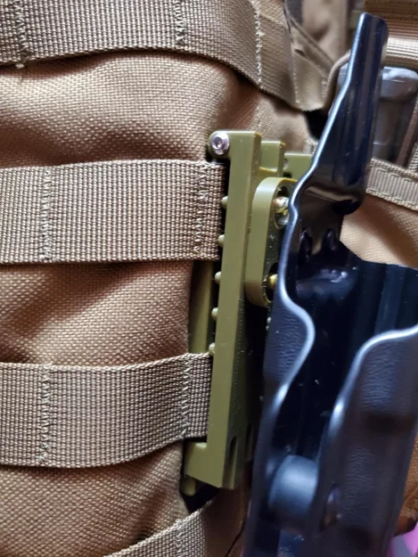 Mussy Molle clips to Vedder holster - Image 1