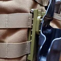 Mussy Molle clips to Vedder holster - Thumbnail 1