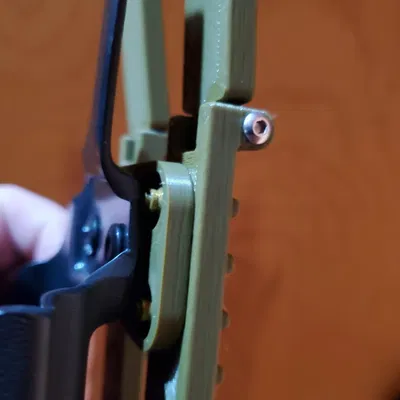 Mussy Molle clips to Vedder holster