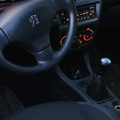 Chỗ Để Ly Cho Xe Peugeot 206