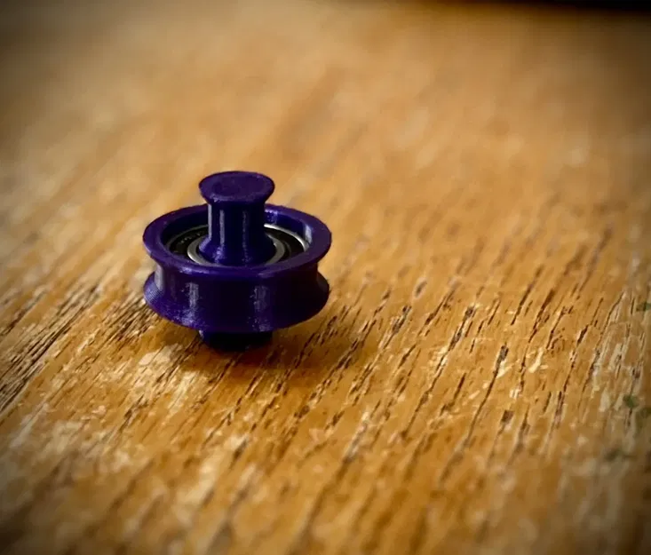 Bánh xe giữ cuộn dây tóc xài bạc đạn 6901 - Image 1