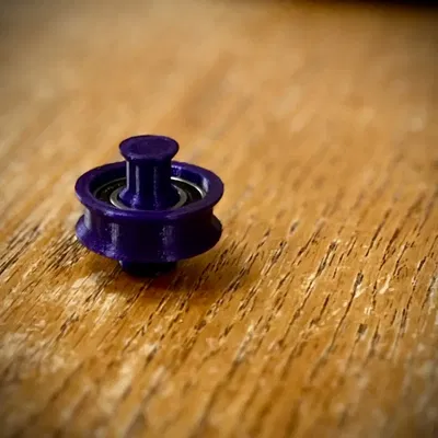 Bánh xe giữ cuộn dây tóc xài bạc đạn 6901