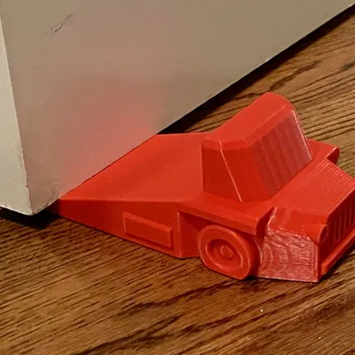 Cục Chặn Cửa Hình Xe Tải