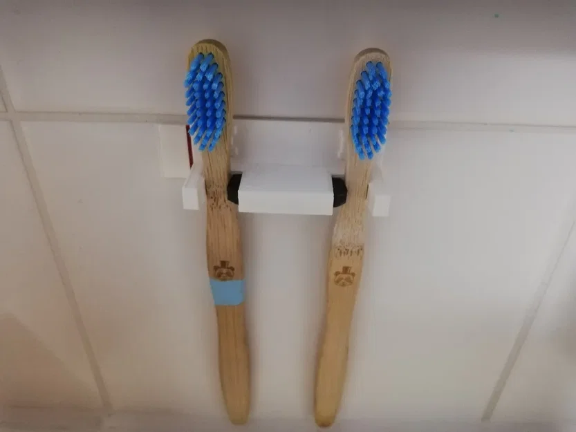 Holder for toothbrushes to be mounted on a wall - Image 1