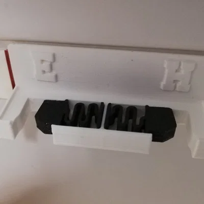 Holder for toothbrushes to be mounted on a wall